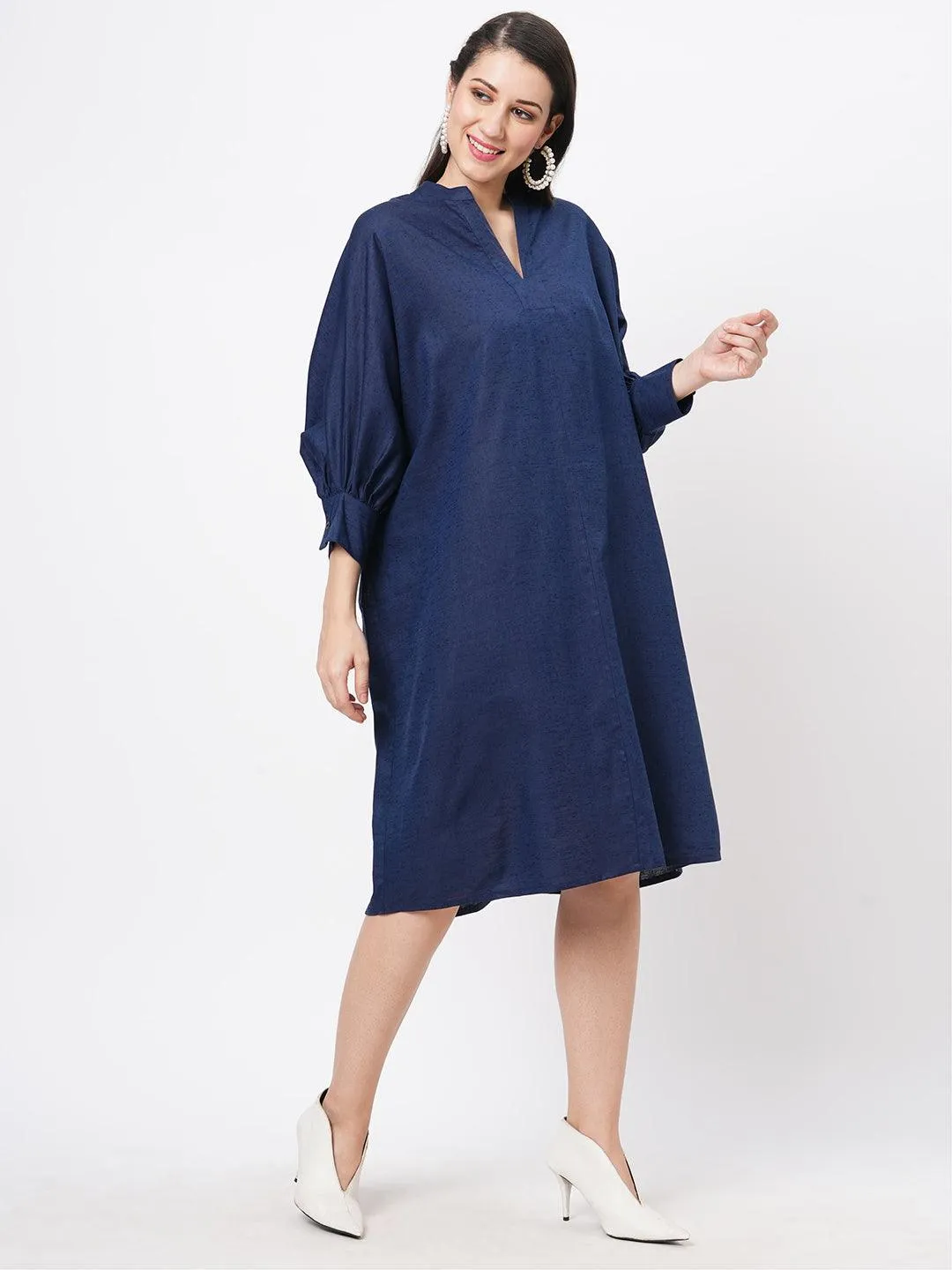 Hashtag Be Featuring a wide relaxed fit kaftan sleeve knee length dress in solid blue