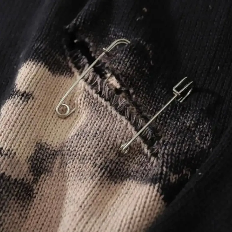 Pinned and Ripped Sweater
