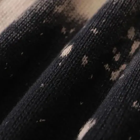 Pinned and Ripped Sweater